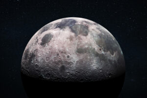 Space view of the moon's cratered surface with a star-filled outer space background. Deep space exploration and astronomy concept. Moon with detailed craters and surface